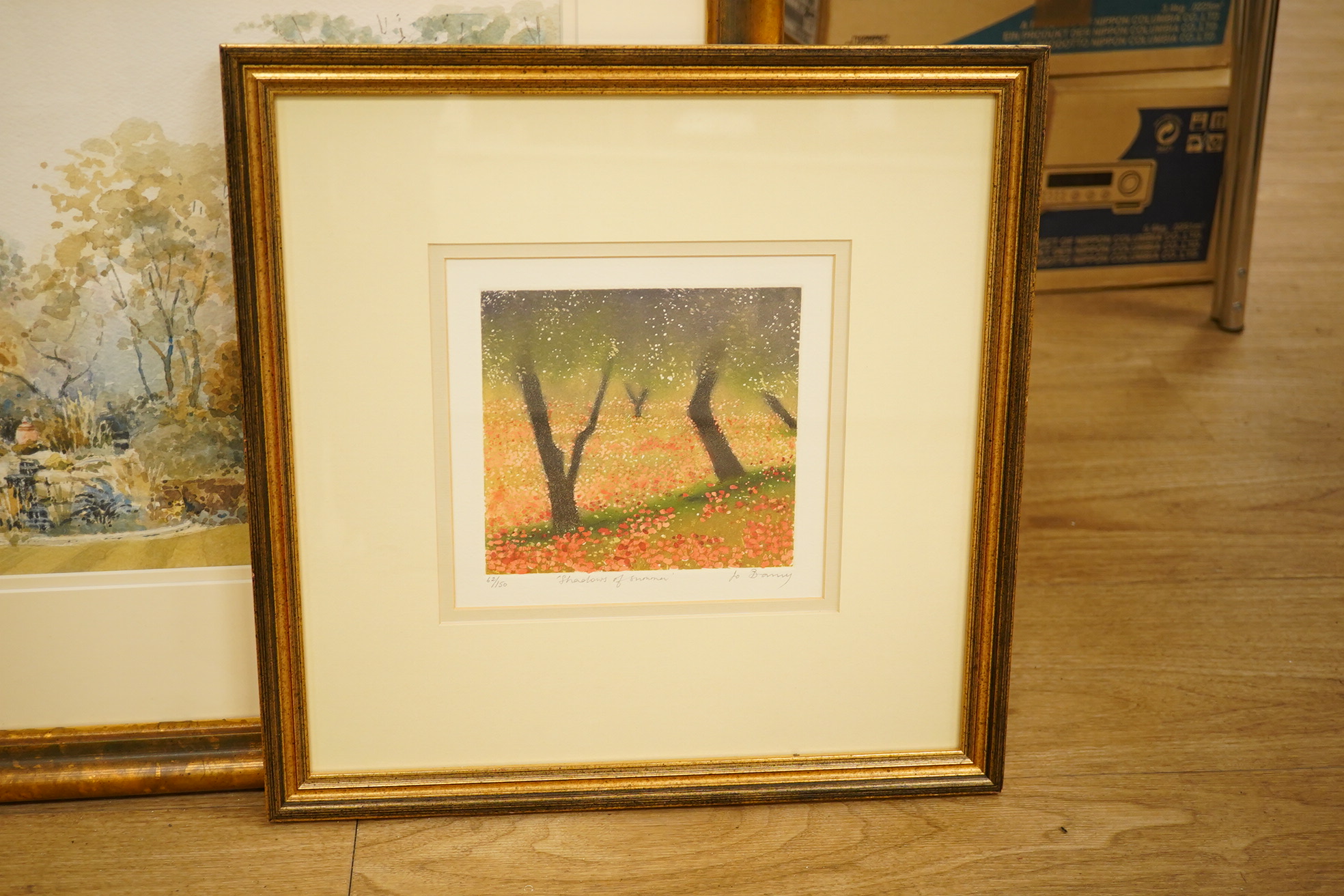 Four watercolours and prints including a still life of flowers, garden scene and an etching of flying geese, largest 38 x 32cm. Condition - mostly good